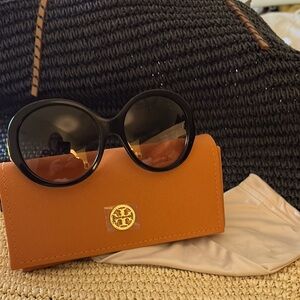 Stylish Black Sunglasses with Orange Case